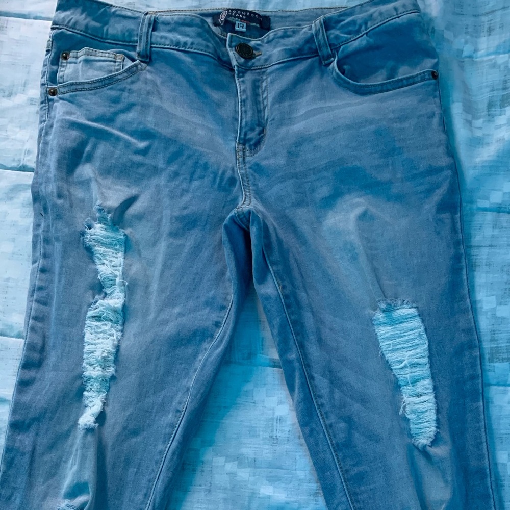 Light blue ripped jeans